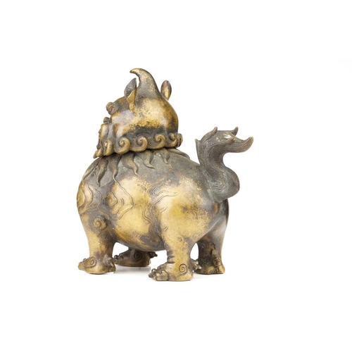 75 - A large Chinese bronze Pixiu censor, with open mouth, scrolling mane and eyebrows, the ears pricked,... 