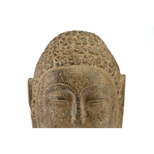 83 - A Chinese-carved stone head of the Gautama Buddha with 