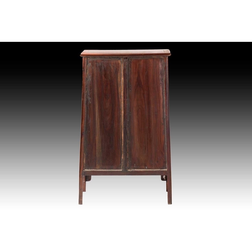 90 - A Chinese Huanghuali tapering two-door cabinet with radiused corners, Qing Dynasty. Each door with f... 