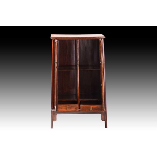 90 - A Chinese Huanghuali tapering two-door cabinet with radiused corners, Qing Dynasty. Each door with f... 