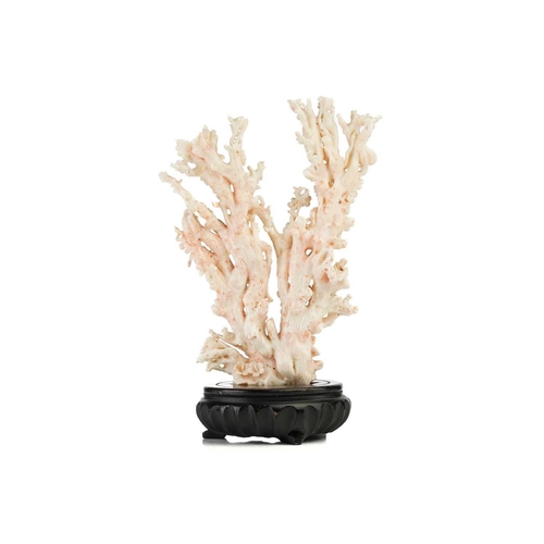 94 - A Chinese mottled pink/white coral carving in the form of a flowering prunus tree, 20th century, wit... 