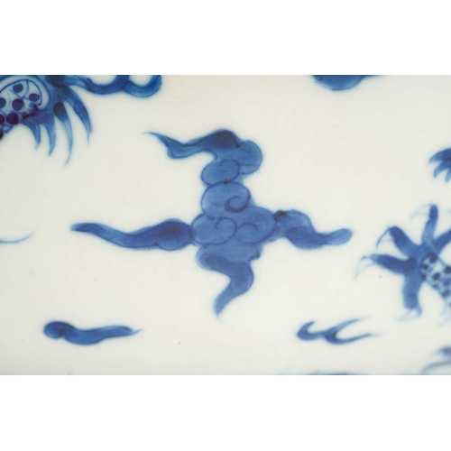 95 - A Chinese porcelain blue & white dragon bowl, the interior with a single writhing dragon, the exteri... 