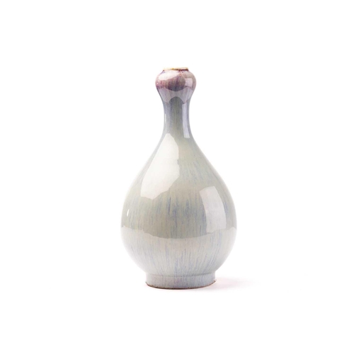 127 - A Chinese porcelain suantouping vase, the lavender glazed body with splashes of red around the garli... 