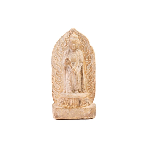 128 - A Chinese carved marble standing Shakyamuni Buddha, Qing, the right hand in vitarka mudra, wearing l... 