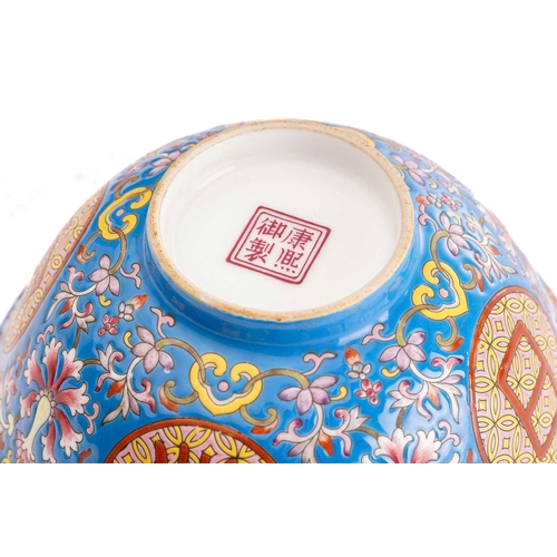 129 - A Chinese porcelain blessings bowl, painted with four prominent characters on a cash ground, between... 