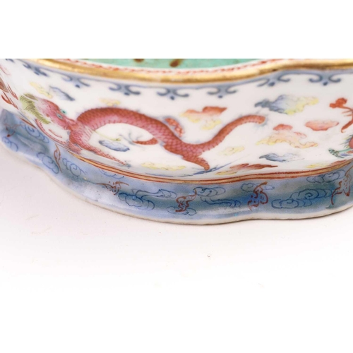 142 - A Chinese famille rose porcelain bowl, Qing, 19th century, the interior with turquoise ground, the e... 