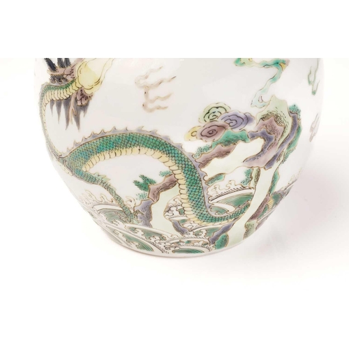 143 - A Chinese porcelain famille verte dragon vase, of double gourd form, painted with two dragons writhi... 