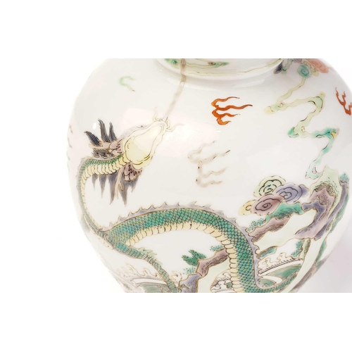 143 - A Chinese porcelain famille verte dragon vase, of double gourd form, painted with two dragons writhi... 