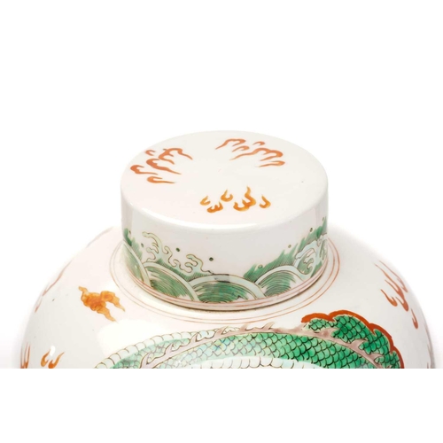 147 - A Chinese porcelain Famille verte ginger jar & cover, painted with a dragon amongst fiery clouds abo... 