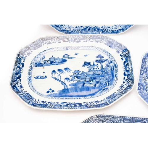 148 - A collection of Chinese export blue & white meat plates and stands, Qing, 18th century, comprising a... 