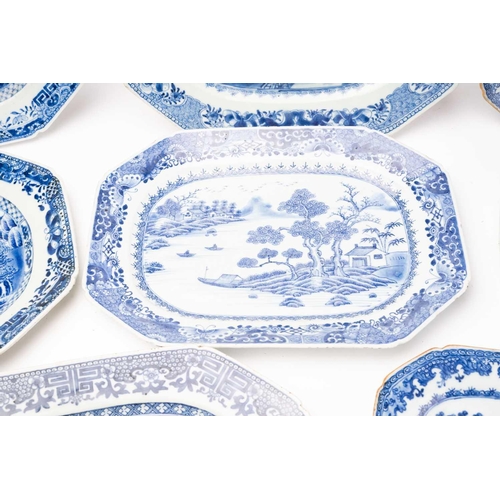 148 - A collection of Chinese export blue & white meat plates and stands, Qing, 18th century, comprising a... 