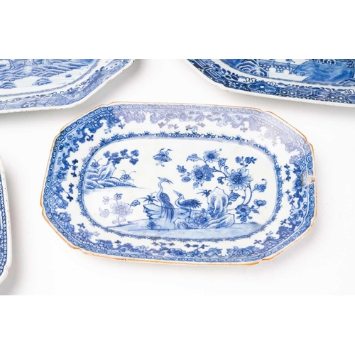 148 - A collection of Chinese export blue & white meat plates and stands, Qing, 18th century, comprising a... 