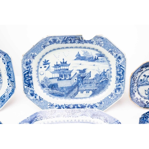 148 - A collection of Chinese export blue & white meat plates and stands, Qing, 18th century, comprising a... 