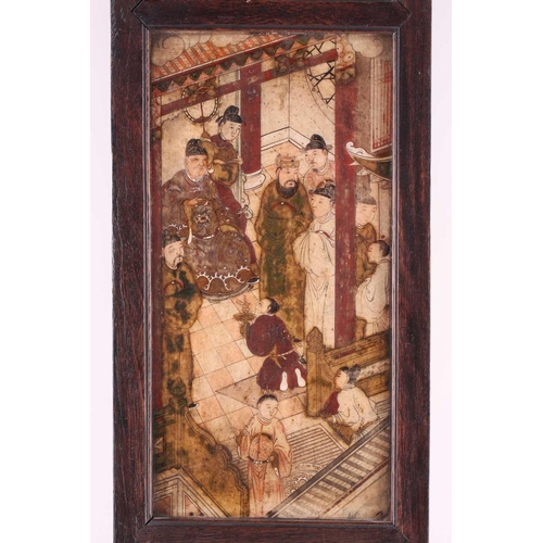 150 - A Chinese soapstone triptych, late Qing, the centre panel painted with a court scene between panels ... 