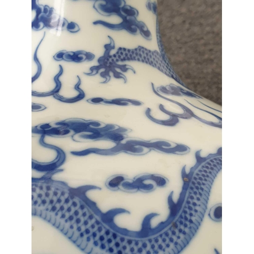 154 - A Chinese blue & white dragon vase, Tianqiuping, painted with two opposing dragons facing a flaming ... 