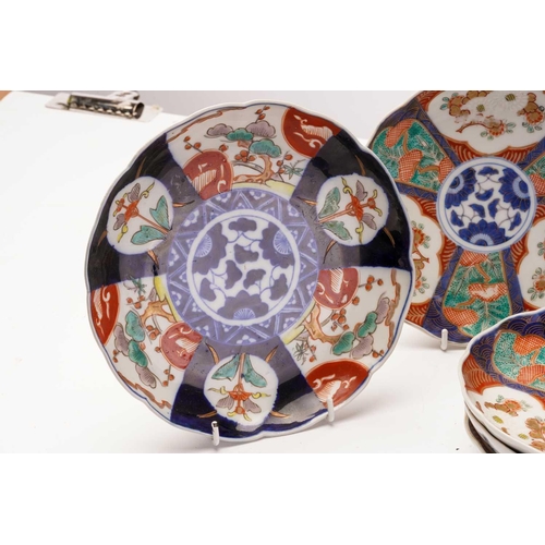 155 - A collection of Japanese imari porcelain, Meiji - Taisho, comprising a large bowl, the exterior pain... 