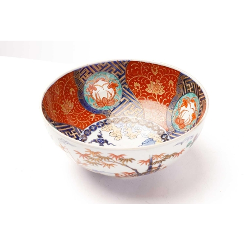 155 - A collection of Japanese imari porcelain, Meiji - Taisho, comprising a large bowl, the exterior pain... 