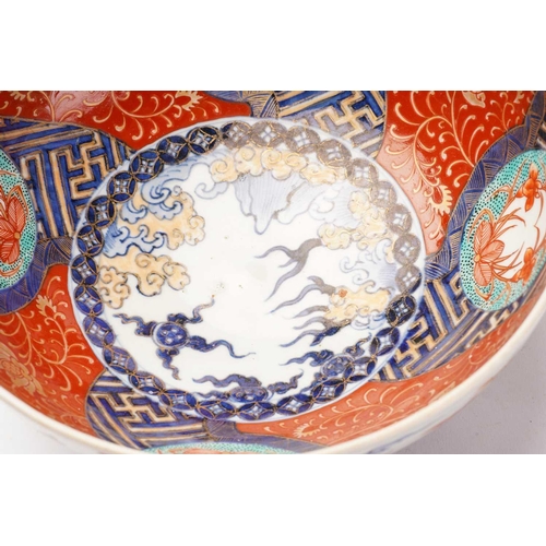 155 - A collection of Japanese imari porcelain, Meiji - Taisho, comprising a large bowl, the exterior pain... 