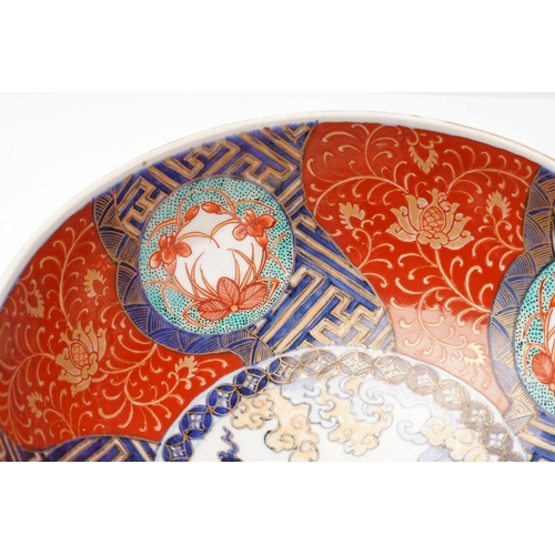 155 - A collection of Japanese imari porcelain, Meiji - Taisho, comprising a large bowl, the exterior pain... 