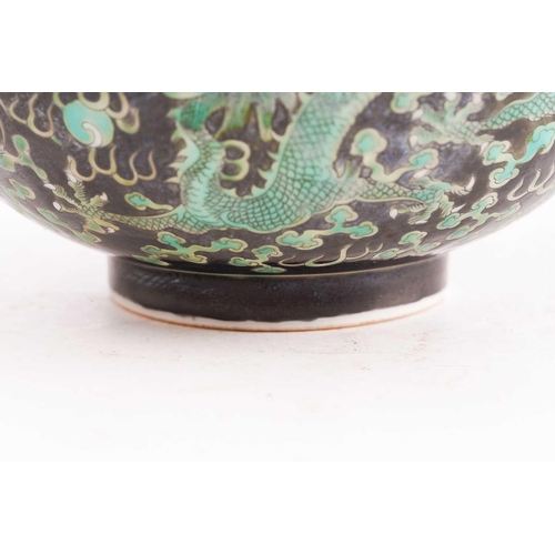 158 - A Chinese porcelain dragon bowl, painted with three dragons chasing a pearl through fiery clouds aga... 