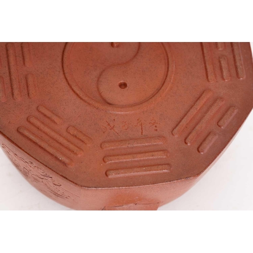 161 - A Chinese yixing octagonal teapot, the knop formed as a recumbent water buffalo, the body incised wi... 