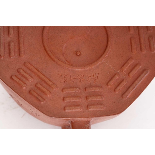 161 - A Chinese yixing octagonal teapot, the knop formed as a recumbent water buffalo, the body incised wi... 