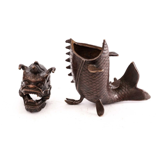 163 - A Chinese bronze censor in the form of a leaping dragon carp, 21cmNo obvious faults.