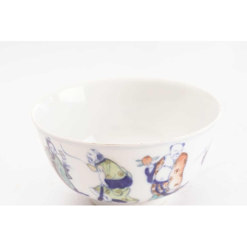 172 - A Chinese porcelain wucai bowl, painted with the eight immortals, above a band of waves, apocryphal ... 