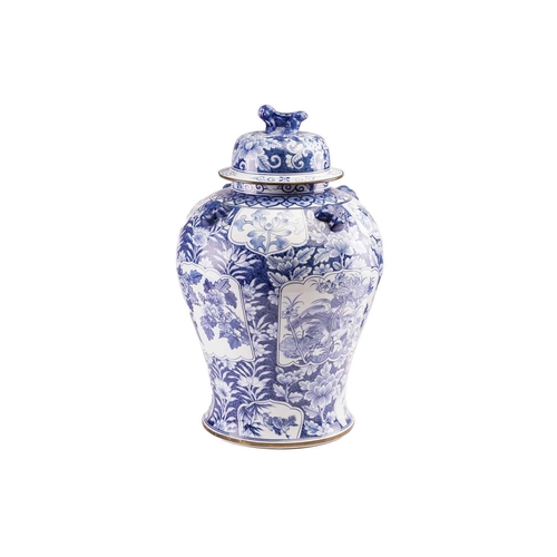 173 - A pair of large Chinese style porcelain vases and covers, the covers with stylised shi shi knops, th... 