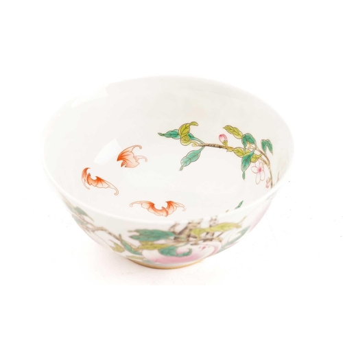 174 - A Chinese porcelain bowl, painted throughout with peaches, blossom and red bats, apocryphal four cha... 