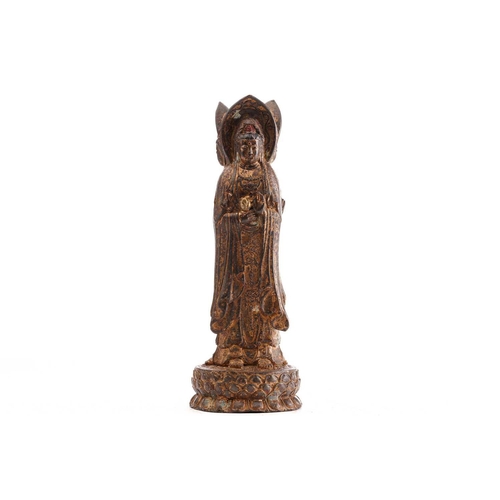 183 - A Chinese bronze figure of the Guanyin of Nanshan, the standing figure dressed in loose robes and je... 