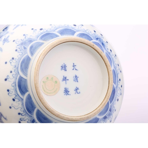 184 - A Chinese porcelain blue & white Cranes bowl, painted with a variety of cranes and bats above spumin... 