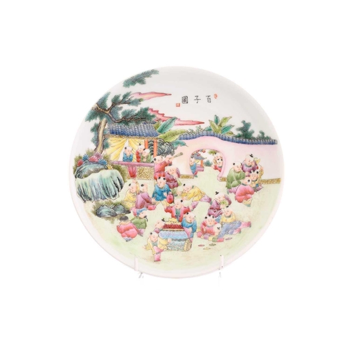 186 - A Chinese porcelain famille rose boys dish, painted with numerous boys at play within a walled garde... 