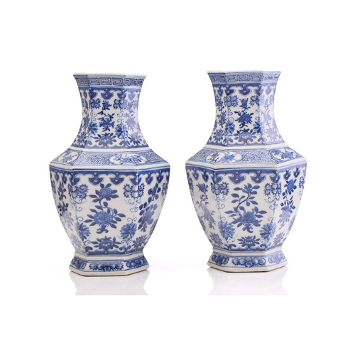 190 - A pair of Chinese blue & white vases, Qing, 19th century, of hexagonal form, painted with panels of ... 