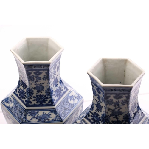 190 - A pair of Chinese blue & white vases, Qing, 19th century, of hexagonal form, painted with panels of ... 