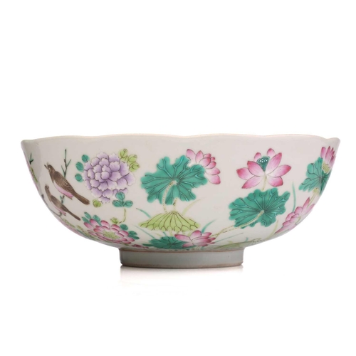 196 - A Chinese porcelain bowl famille bowl, with scalloped rim, painted with birds amongst lotus flowers ... 