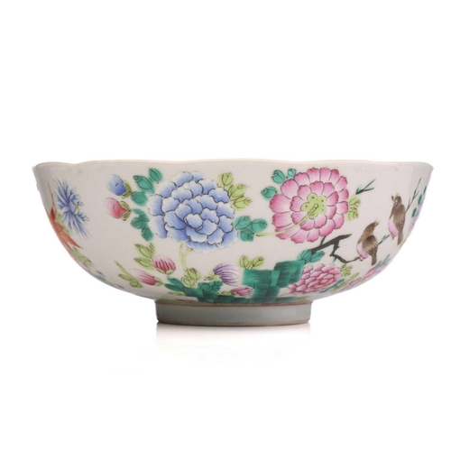 196 - A Chinese porcelain bowl famille bowl, with scalloped rim, painted with birds amongst lotus flowers ... 