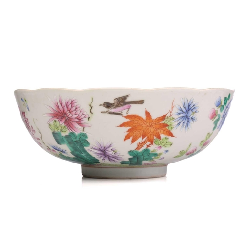 196 - A Chinese porcelain bowl famille bowl, with scalloped rim, painted with birds amongst lotus flowers ... 