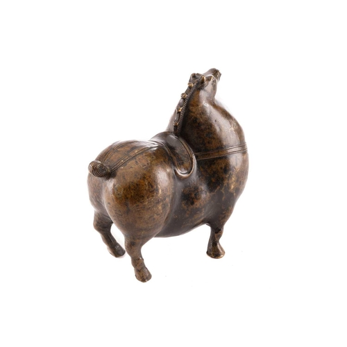 200 - A Chinese tang dynasty style bronze obese horse, with dressed mane and tail, 15.5cm wide, 16.5cm hig... 