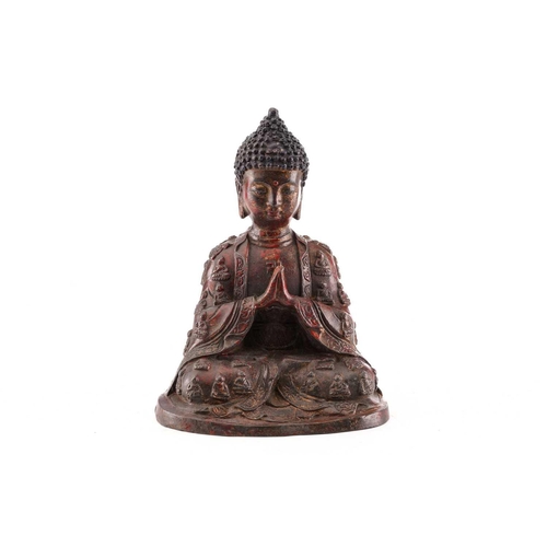 201 - A Chinese bronze figure of Samantabhadra Buddha, the loose robes with relief cast luohan, traces of ... 