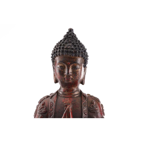 201 - A Chinese bronze figure of Samantabhadra Buddha, the loose robes with relief cast luohan, traces of ... 