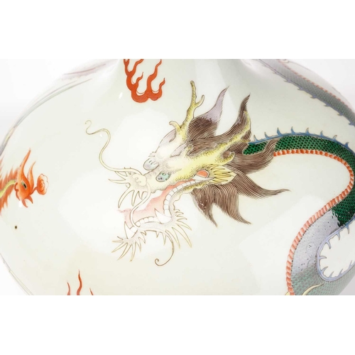 203 - A Chinese porcelain tianqiuping dragon and fenghuang vase, painted amongst fiery clouds, between a b... 