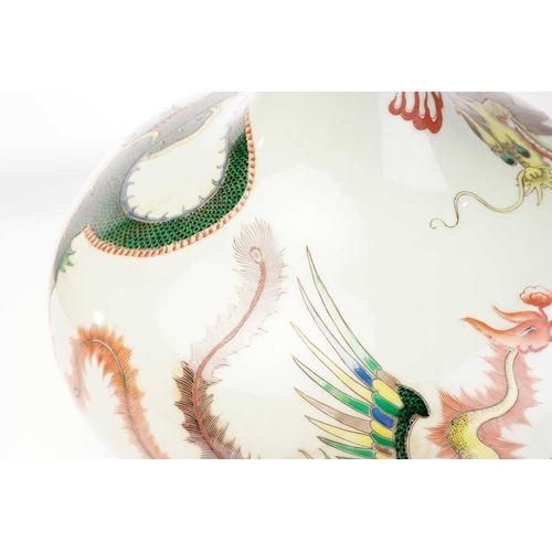 203 - A Chinese porcelain tianqiuping dragon and fenghuang vase, painted amongst fiery clouds, between a b... 