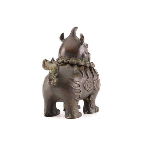 204 - A Chinese bronze censor in the form of a Pixiu, with scrolling mane, the body with relief cast cloud... 