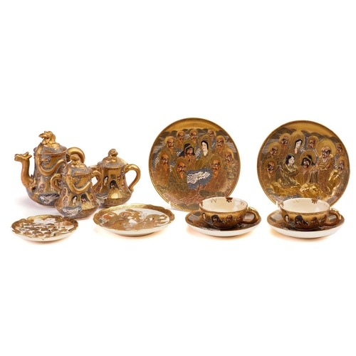 209 - Japanese Satsuma, Meiji period, comprising two deities plates with dragon, one with relief moulded f... 