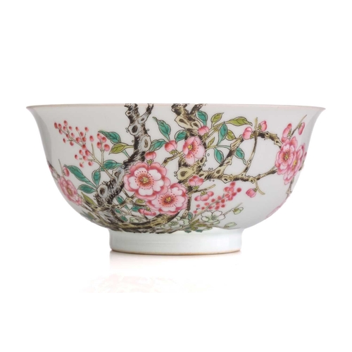 212 - A Chinese porcelain prunus blossom bowl, painted with pink and white flowers on gnarled branches, a ... 