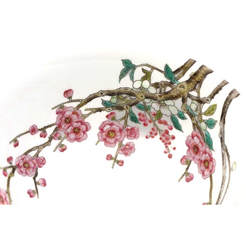 212 - A Chinese porcelain prunus blossom bowl, painted with pink and white flowers on gnarled branches, a ... 