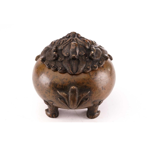 214 - A Chinese bronze censor, modelled as a round and squat Pixiu, the head forming the cover with scroll... 