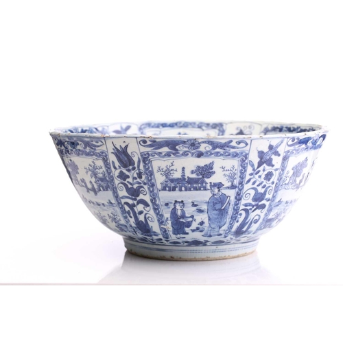 215 - A Chinese blue & white porcelain Kraak bowl, Wanli (1573 - 1619), the interior centre painted with a... 