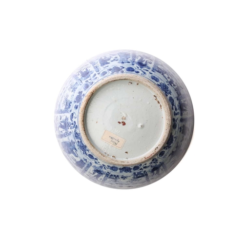 215 - A Chinese blue & white porcelain Kraak bowl, Wanli (1573 - 1619), the interior centre painted with a... 